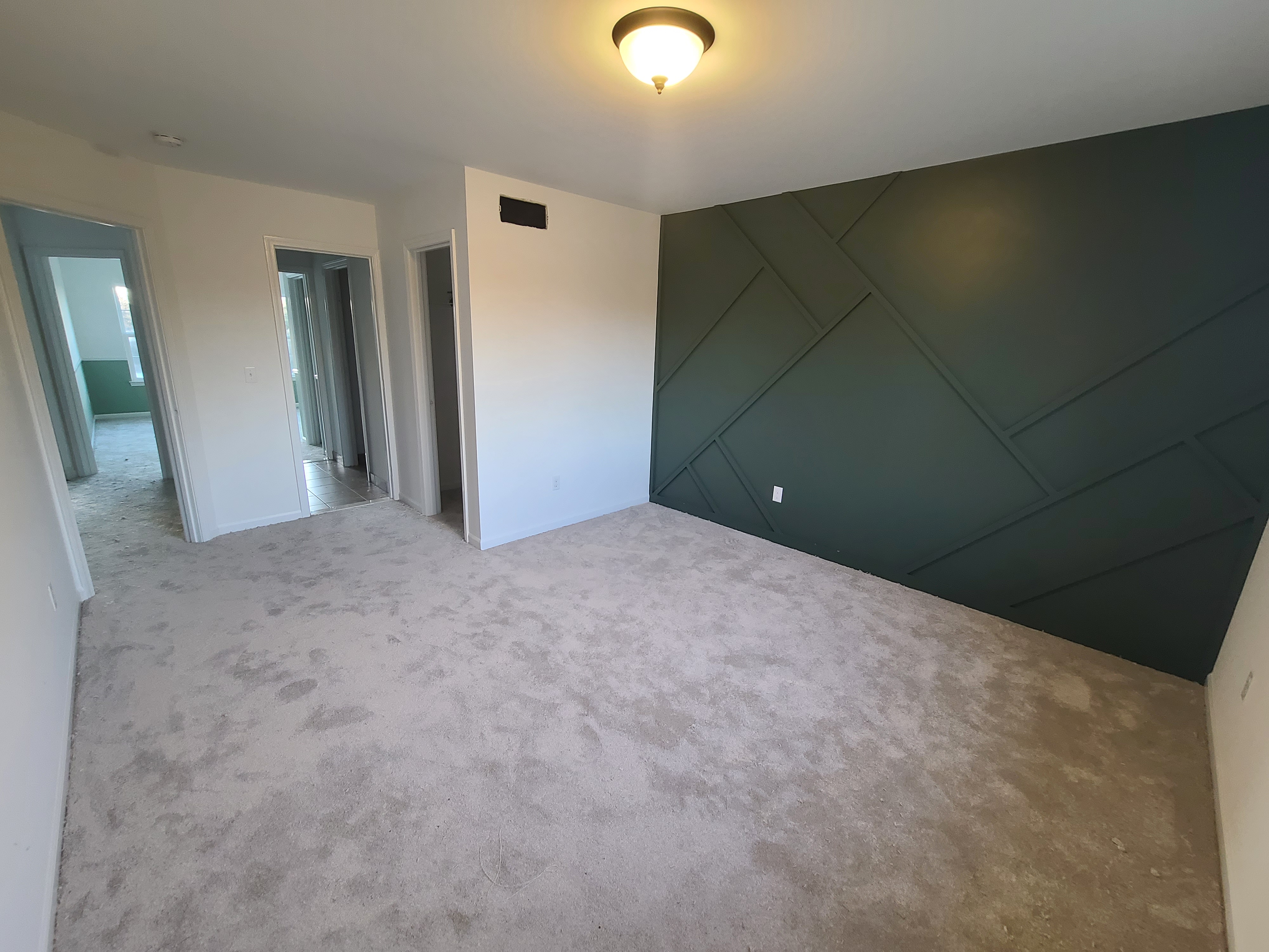 Green geometric accent wall