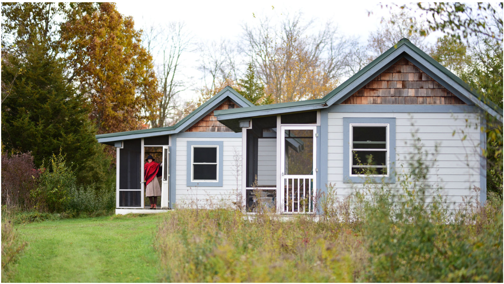 Cottage exterior with autumn foliage